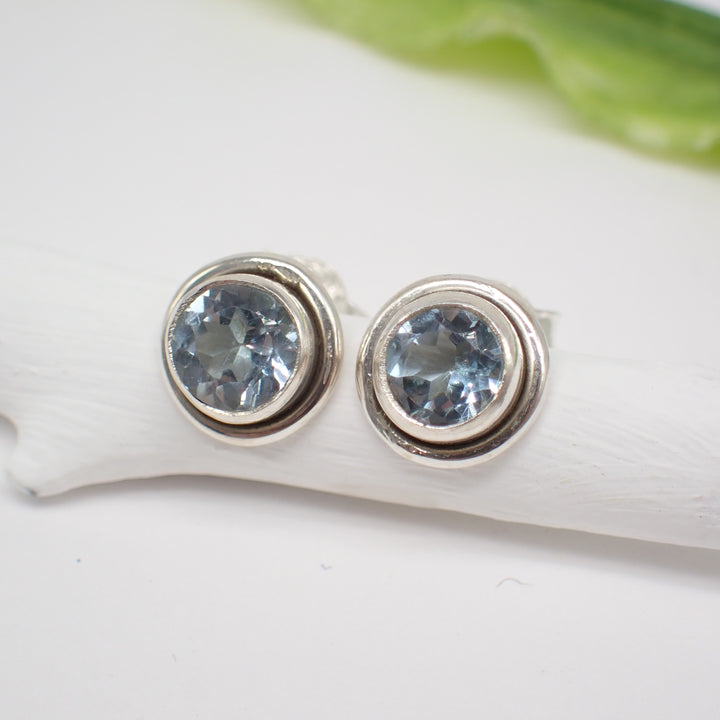 Sterling Silver Faceted Round Blue Topaz Studs