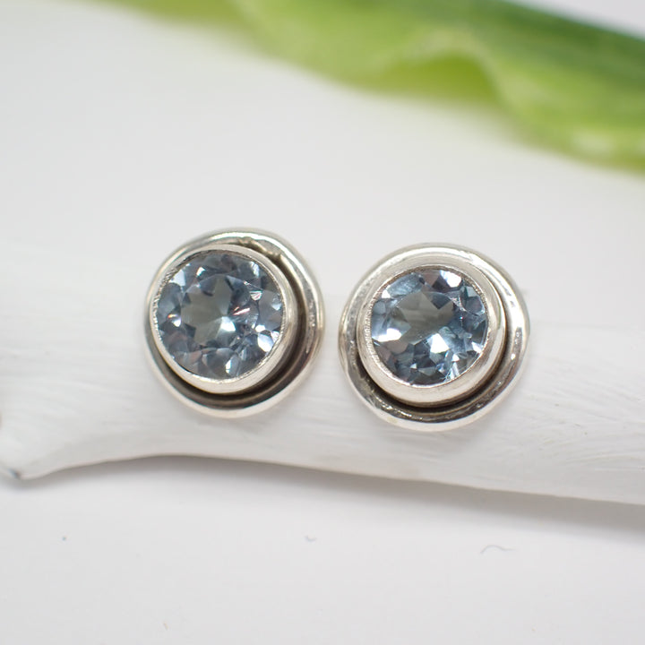 Sterling Silver Faceted Round Blue Topaz Studs