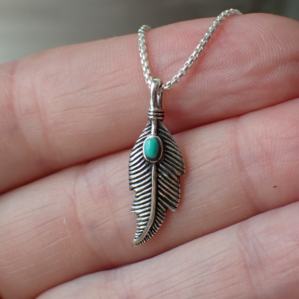 sterling silver feather charm with turquoise