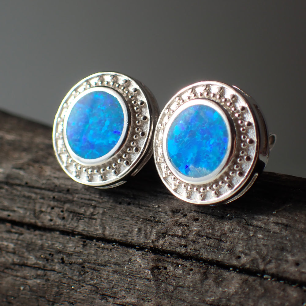 sterling silver blue opal stud earrings