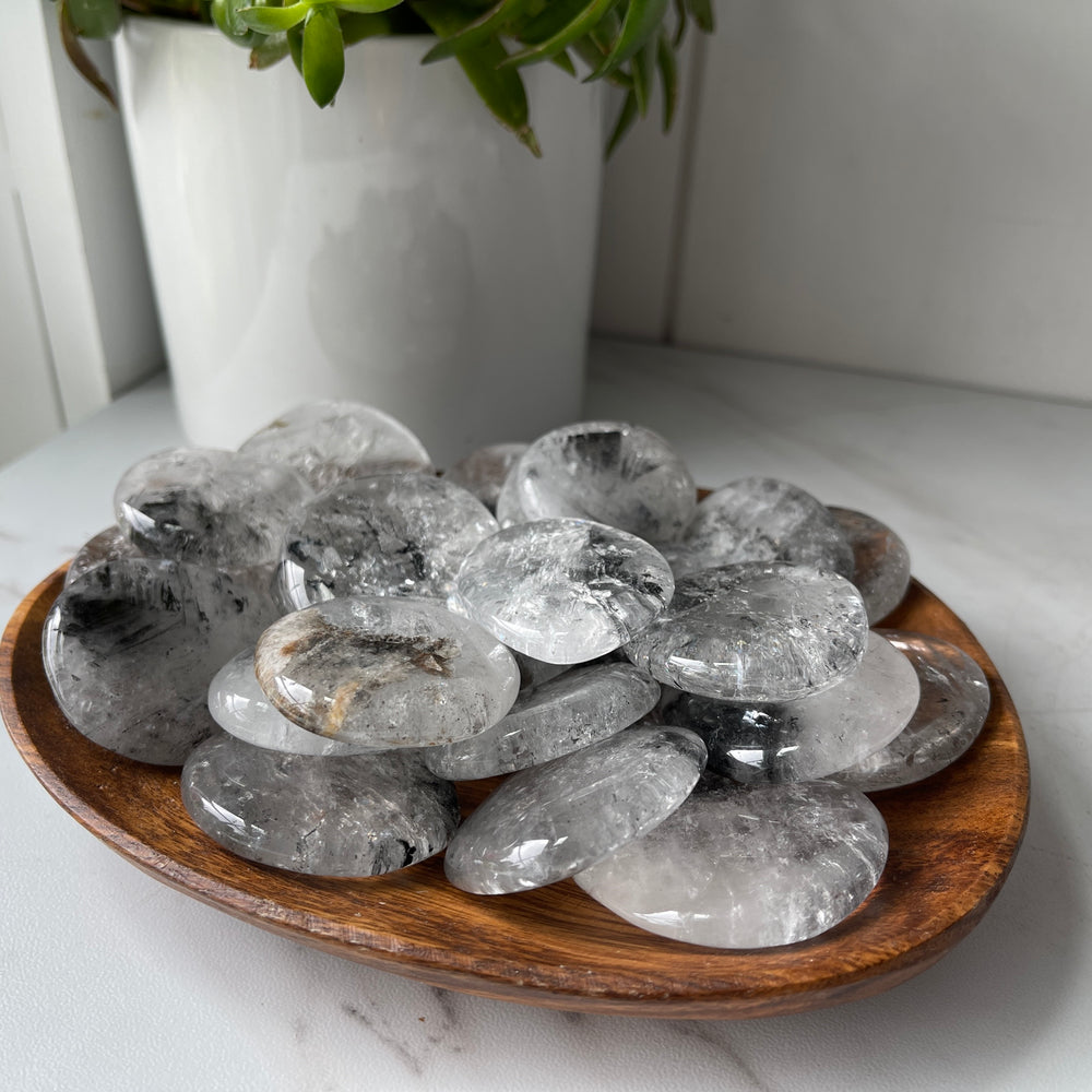 clear quartz crystal worry stone with graphite healing pocket stone