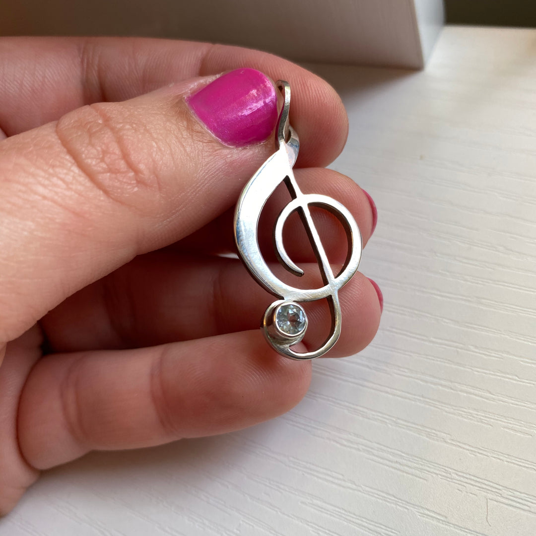 Sterling Silver Music Note and Blue Topaz Pendant