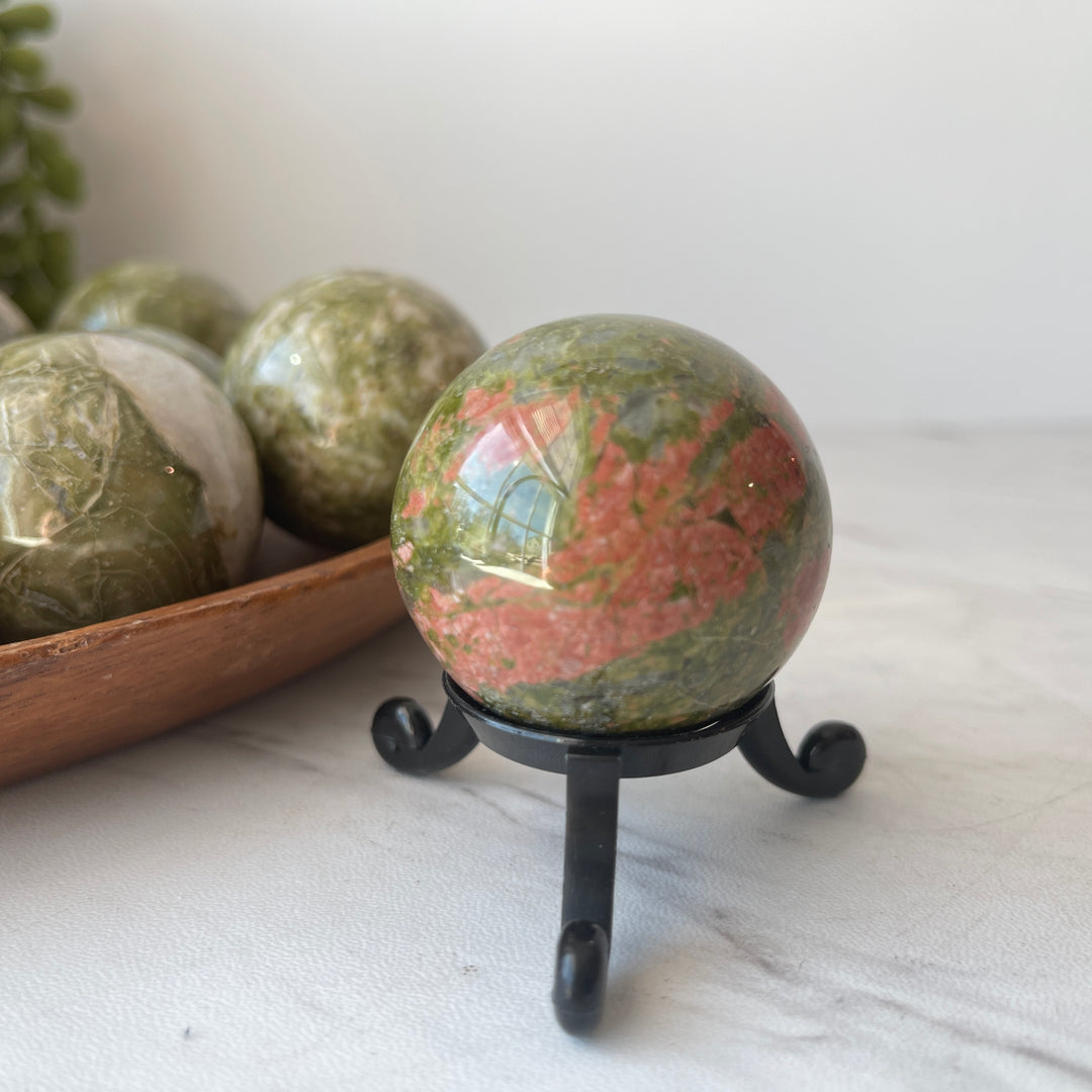 unakite stone crystal sphere on stand